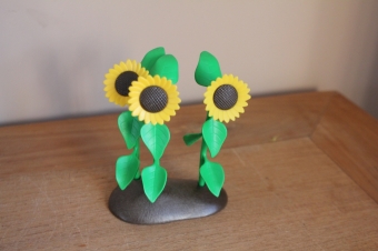 Playmobil 3 zonnen bloemen op bruine plaat